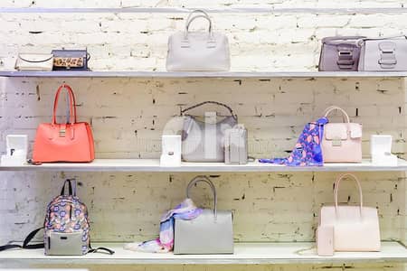 Women's handbags and accessor بوتيك شنط وإكسسوارات نسائية