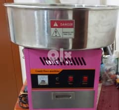 cotton candy machine it's new used only for some days. 0