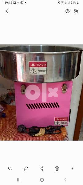 cotton candy machine it's new used only for some days. 1