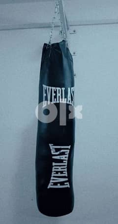 punching bag, punching gloves, mout guards and hand wraps 0