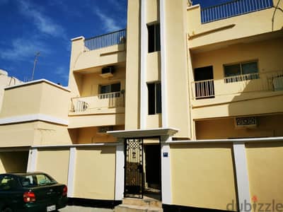 buiding for sale in muharraq near al kubra garden