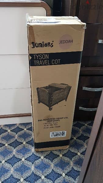 juniors Tyson travel cot