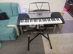 electric piano and stand