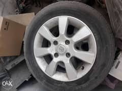 Ring with tire for sale Nissan tida 4 pic. Size 15 0