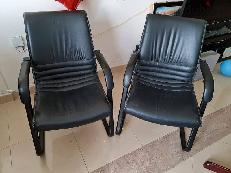 2 office chairs. Black leather finish. In very good condition 0