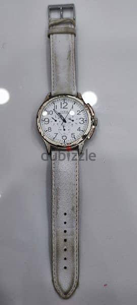 white GUESS brand watch