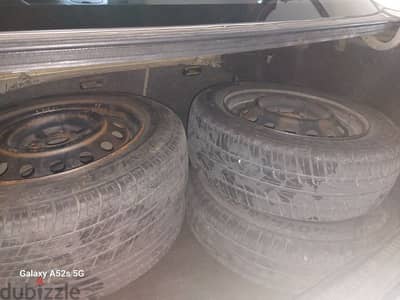 USED 4 TYRES WITH RIMS 14  (TOTAL 25 BHD)