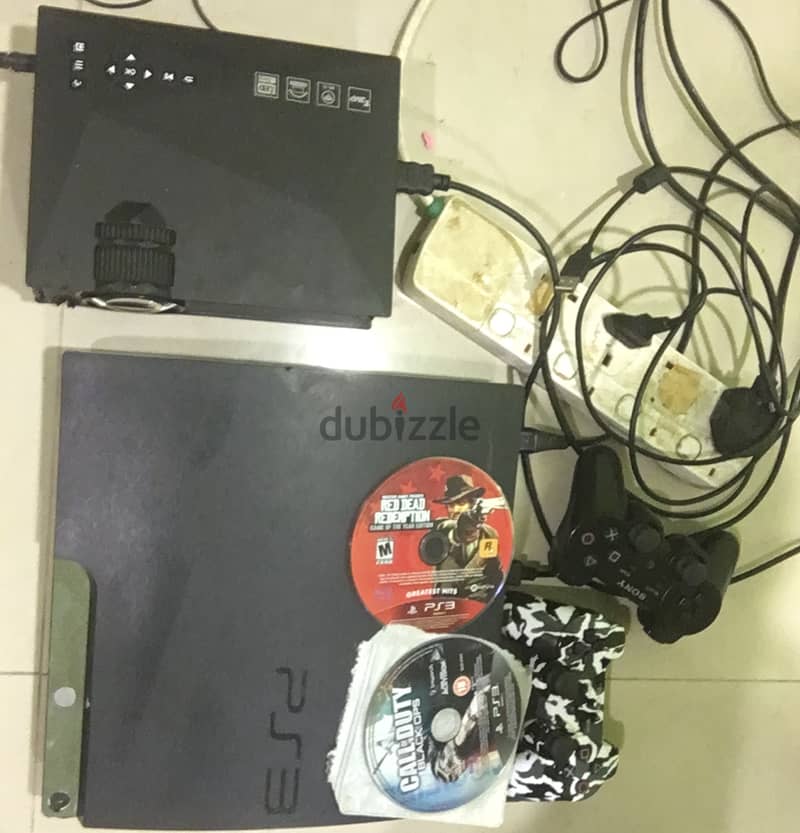 Ps3 with projector and controllers and all accessories 0