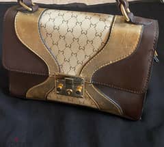 selling milano handbag 0