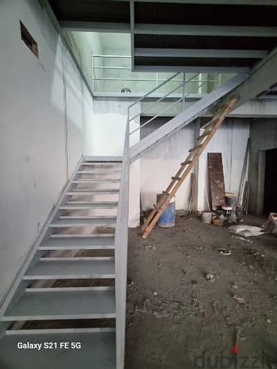 Mezzanine floor with steel Staircase and handrails