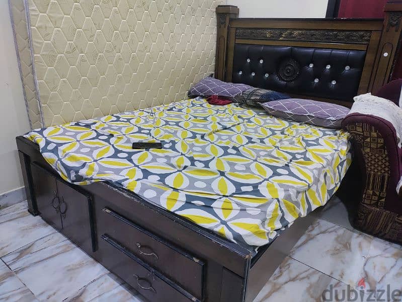 "queen size bed and mattress with storage space. . . 3