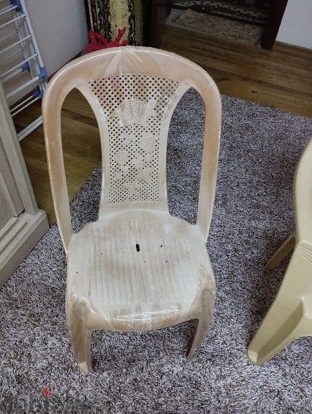2 plastic chairs 2