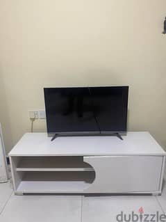 Skyworth 32” TV with wooden stand. 0