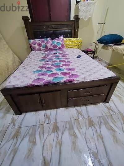 "queen size bed and mattress with storage space. . .