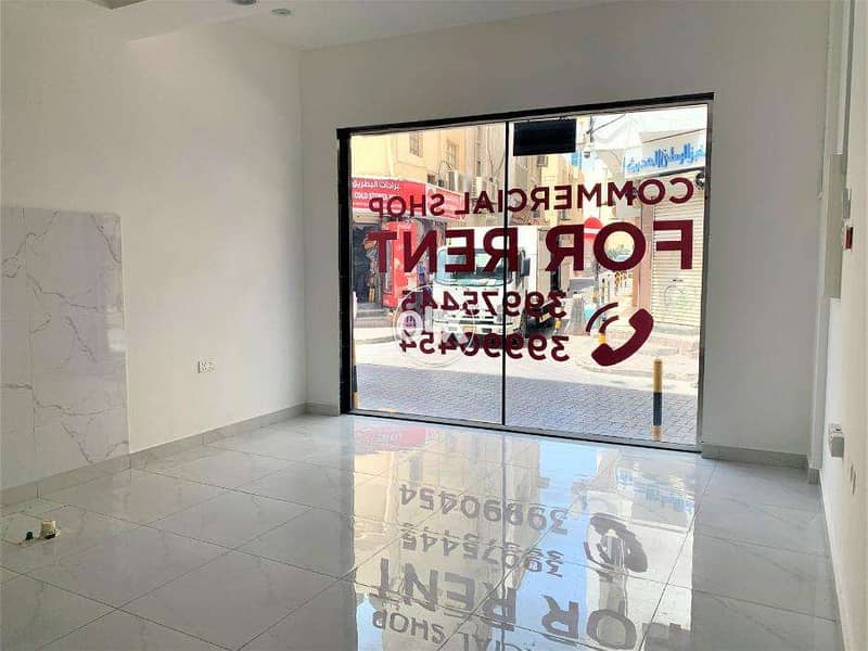 BRAND NEW commercial shop with MEZZANINE for rent in Manama 2