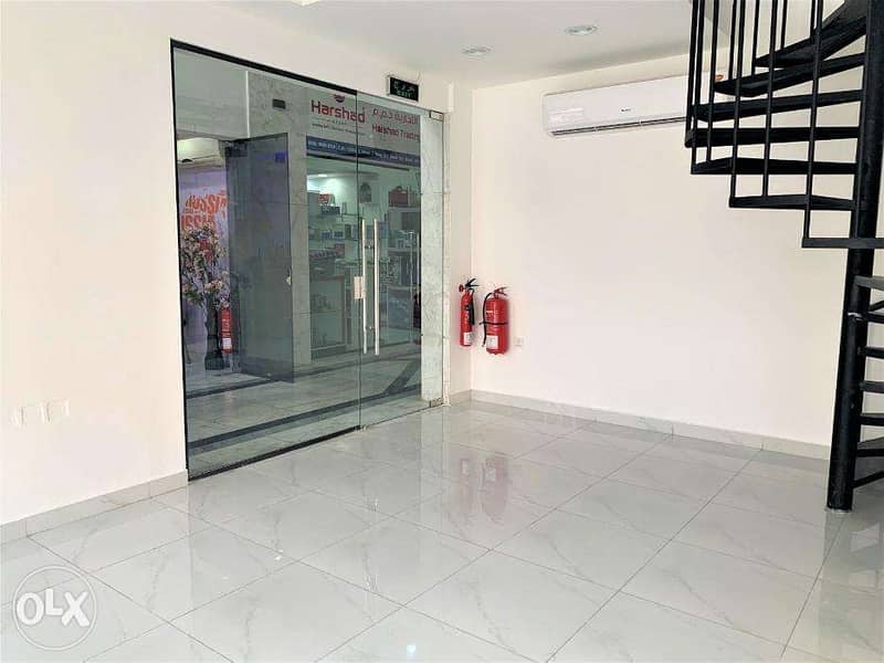 BRAND NEW commercial shop with MEZZANINE for rent in Manama 4