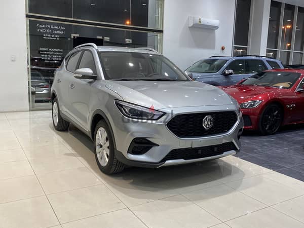 MG ZS 2023 (White) Mileage: Zero Km, Mid Option: Bluetooth, Alloy Wheel,  Cruise Control, Push Start, Sensors, Camera, and More.. 4…