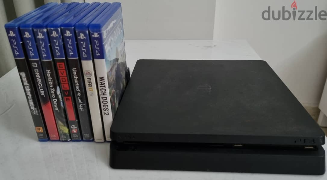 PS4 BUNDLE - (With 7 Games, 1 Conroller and a Game Stand) 1