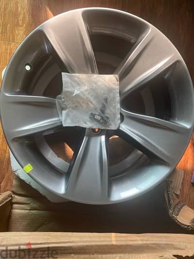 two new original dodge charger rims