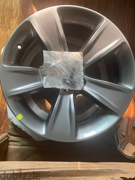 two new original dodge charger rims 0