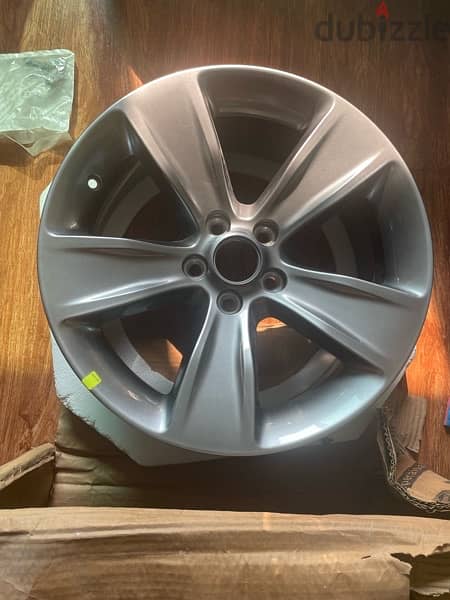 two new original dodge charger rims 1