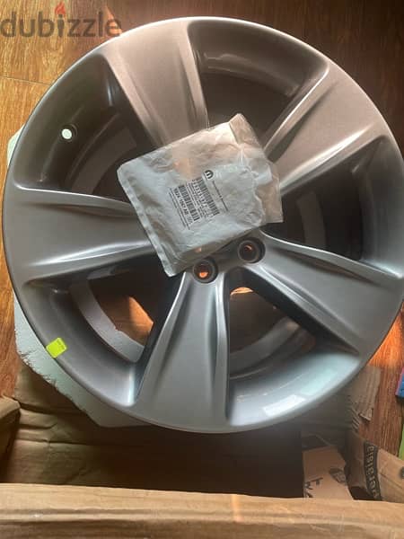 two new original dodge charger rims 2