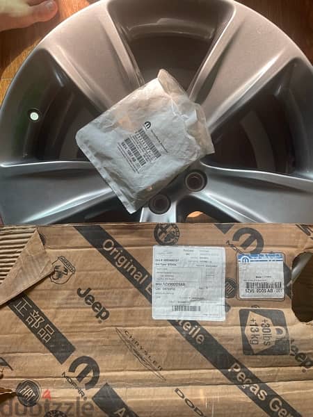 two new original dodge charger rims 4