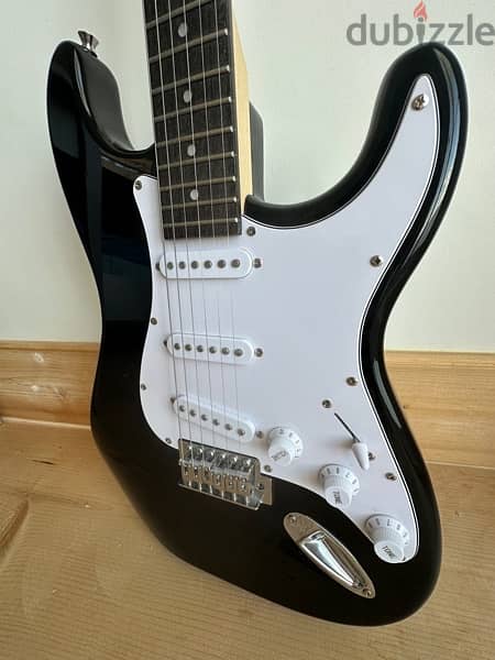 Fender stratocaster + whammy bar and new strings 2
