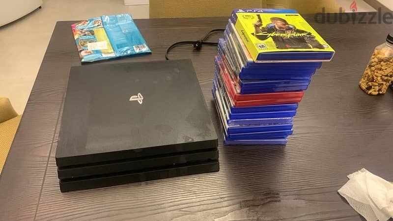 ps4 pro 1tb with 15 brand disc 1