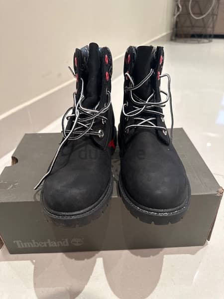 Used black timberland best sale boots