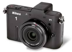 Nikon 1 V1 camera with Nikon 10mm F2.8 lens