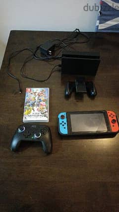Nintendo switch with accessories with a game plus controller