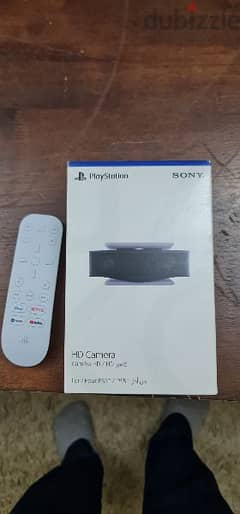 camera new  + remote used  for ps5
