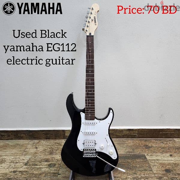Used Black yamaha EG112 electric guitar available in stock