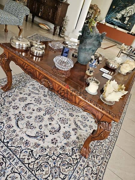3 piece natural wood coffee table set; accessories not included. 2