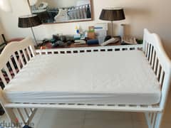 Wooden crib and foam mattress from mothercare