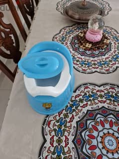 A chair to make a children's toilet with a simple poty cover