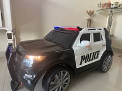 Battery operated police car toy for children