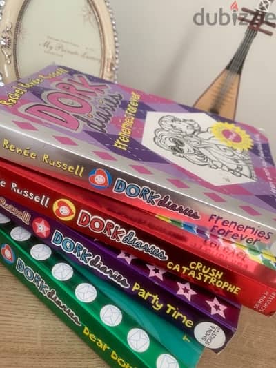 set of 4 “dork diaries” books