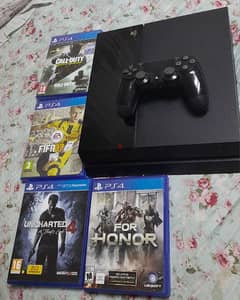 PS4  with 4 CD Games for Sale Urgent