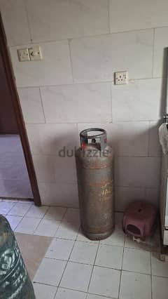 window AC and gas cylinder 0