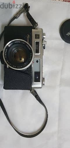 vintage yashica camera with all accesories