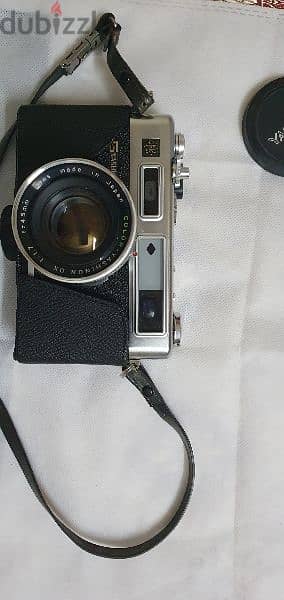 vintage yashica camera with all accesories