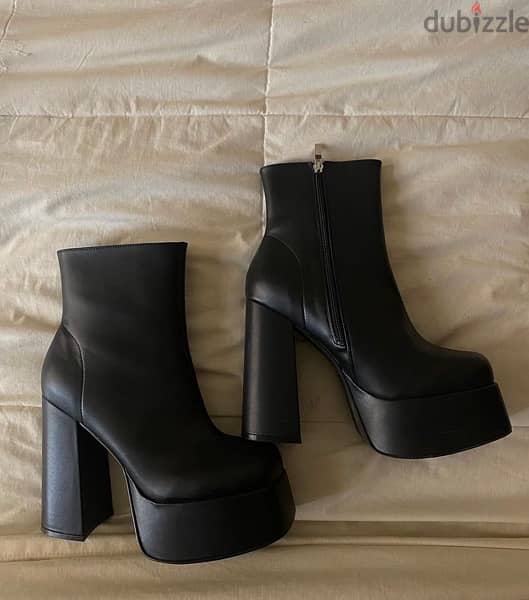 black boots ( brand new ) from the brand “betts “ 0