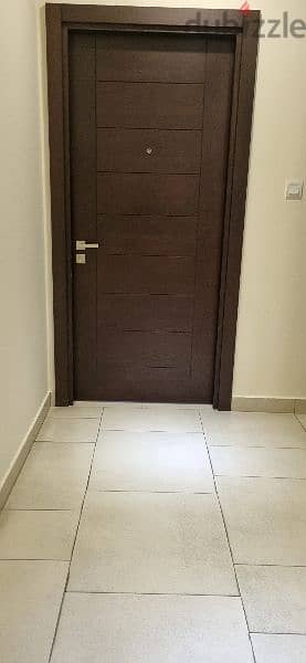 one bedroom semi furnished apartment for rent opposite Seef mall 10