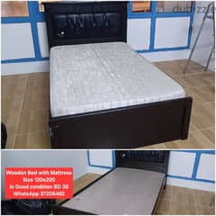 Wooden bed with mattress and other items for sale with Delivery