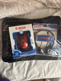 loptops bag with headphones with mouse