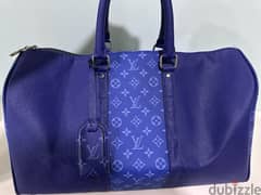Louis Vuitton Duffle Bag 0