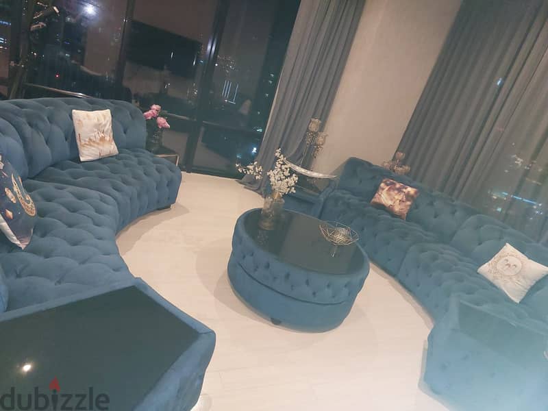 Fancy sofa set with 5 tables and 2 chairsطقم كنب فاخر مكون من 5 طاولات 1