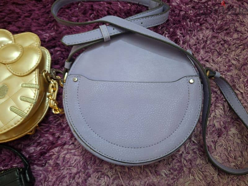 4 women bag original fossil and guess bag kitty golden and purple bag 1